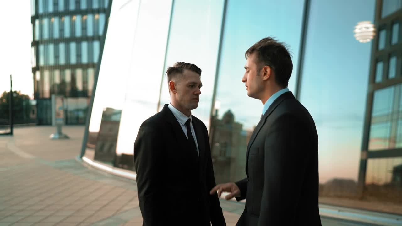 Download   Stock Footage Two Men In Suits Arguing Live Wallpaper