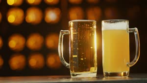 Download   Stock Footage Two Beers Against An Orange Background Live Wallpaper