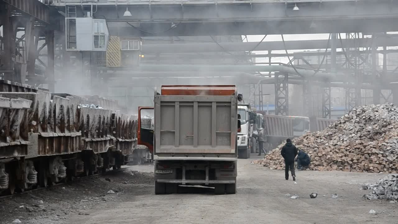 Download   Stock Footage Trucks Parked Inside A Processing Plant Live Wallpaper