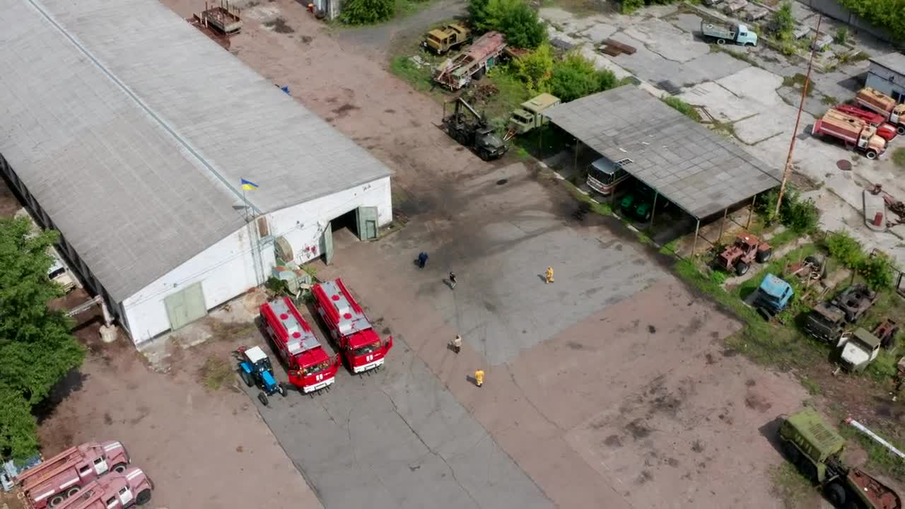 Download   Stock Footage Trucks Inside An Industrial Yard Live Wallpaper