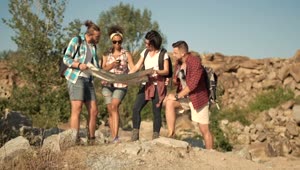 Download   Stock Footage Travelers Watching The Map In The Wild Live Wallpaper