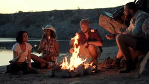 Download   Stock Footage Travelers Cooking Marshmallows In The Bonfire Live Wallpaper