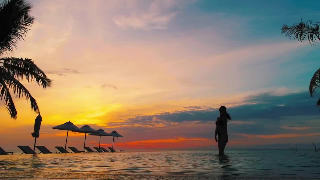 Download Stock Footage Woman In A Pool At Sunset Live Wallpaper Free