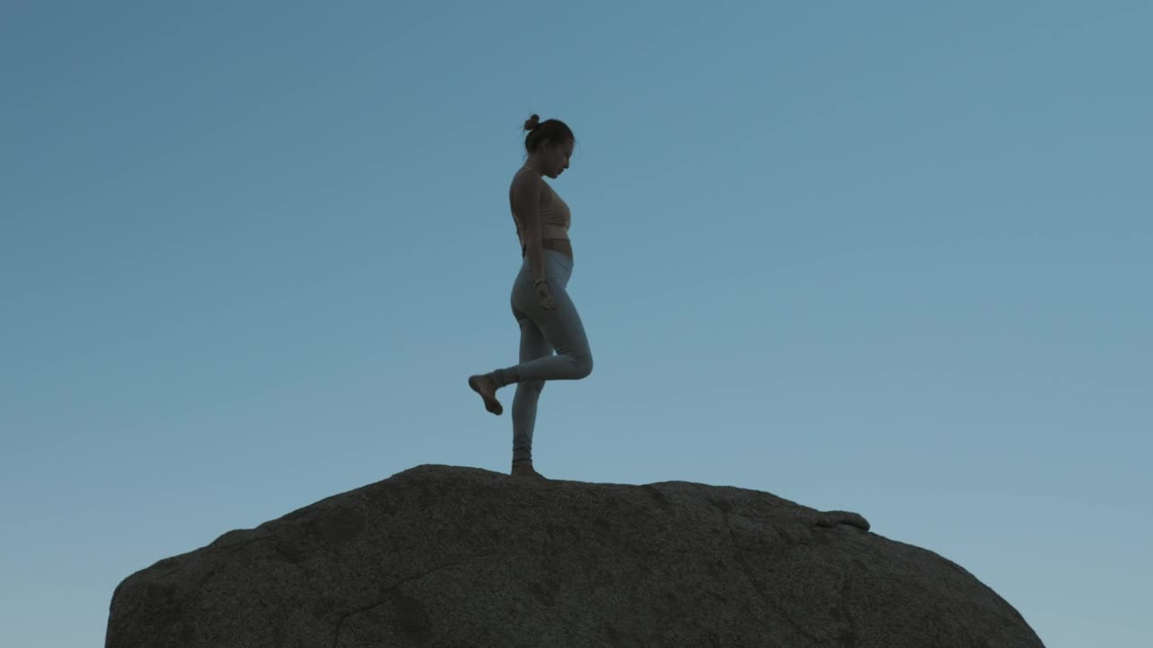 Download Stock Footage Woman Doing Yoga On A Boulder Live Wallpaper Free