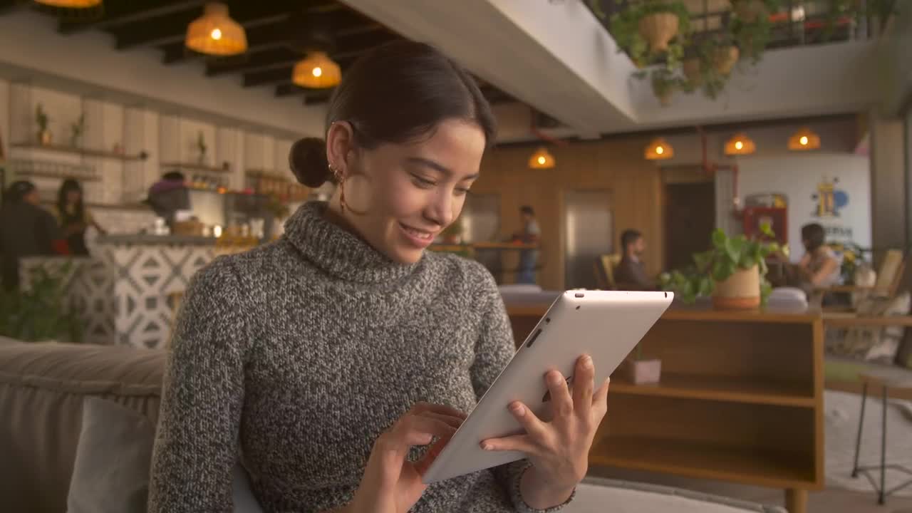 Download Stock Footage Woman Works On Her Tablet Live Wallpaper Free