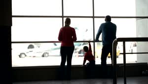 Download Stock Footage Young Family Waiting For Their Flight Live Wallpaper Free
