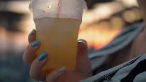 Download Stock Footage Woman Drinking Cold Lemonade Live Wallpaper Free