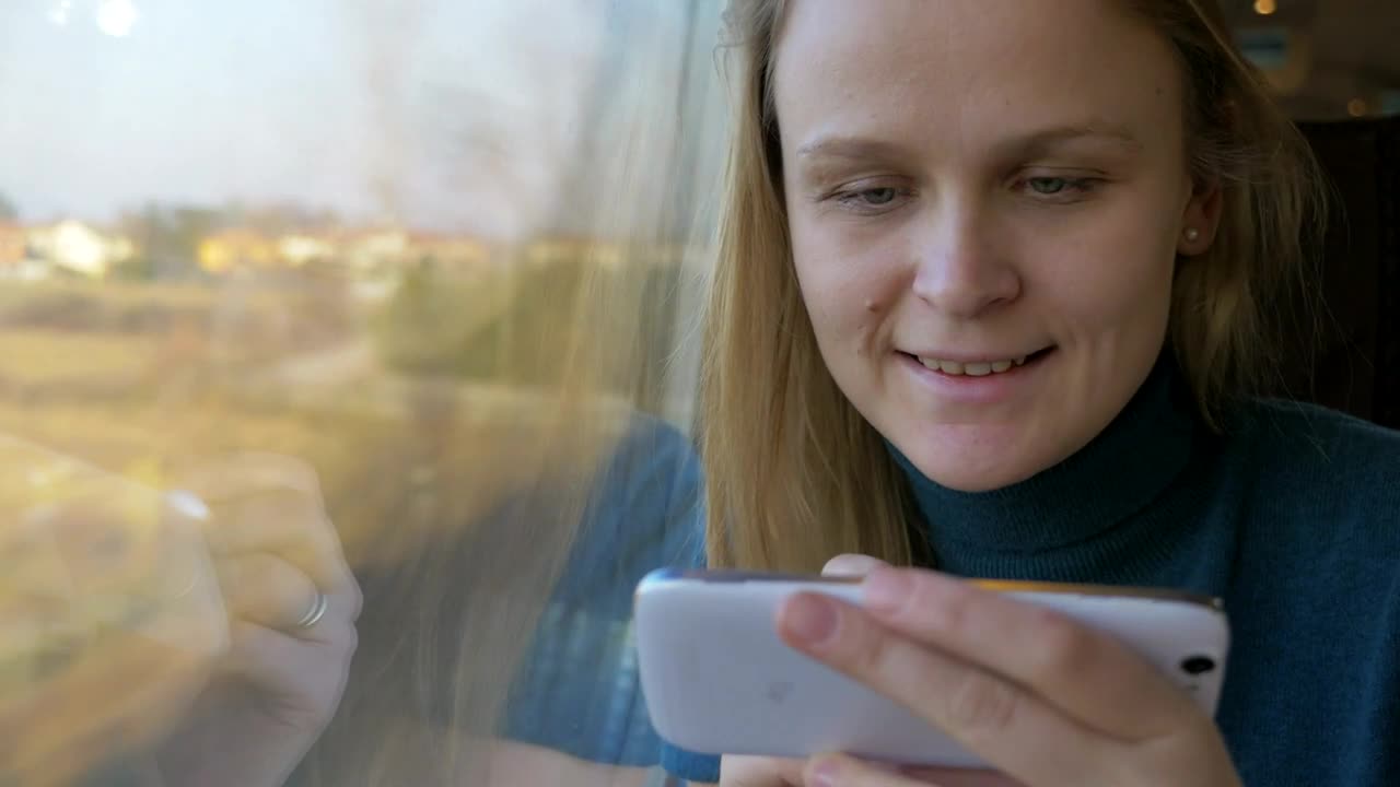 Download Stock Footage Woman Smiles As She Checks Her Messages Live Wallpaper Free