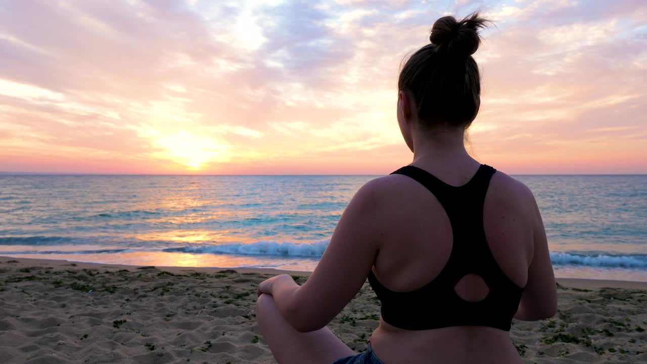 Download Stock Footage Woman Meditating By The Ocean Live Wallpaper Free