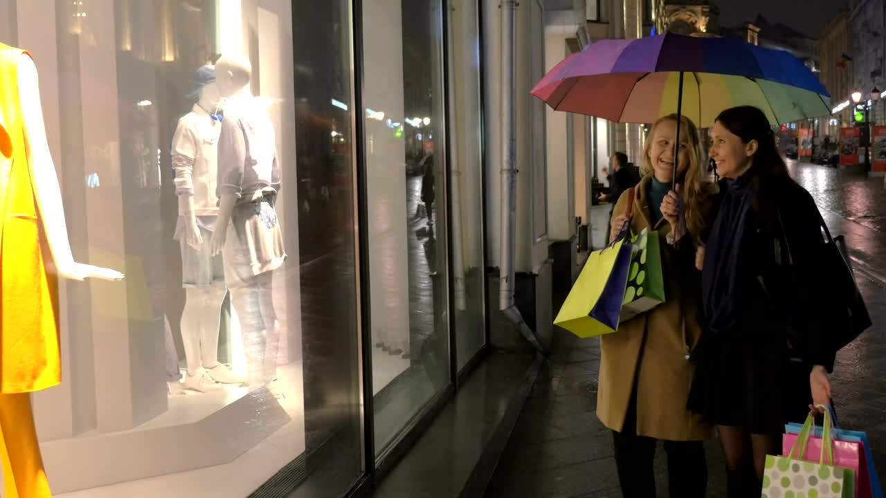 Download Stock Footage Women Window Shopping At Night Live Wallpaper Free