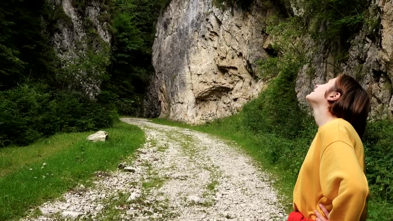 Download Stock Footage Young Woman Hiking Through The Canyon Live Wallpaper Free