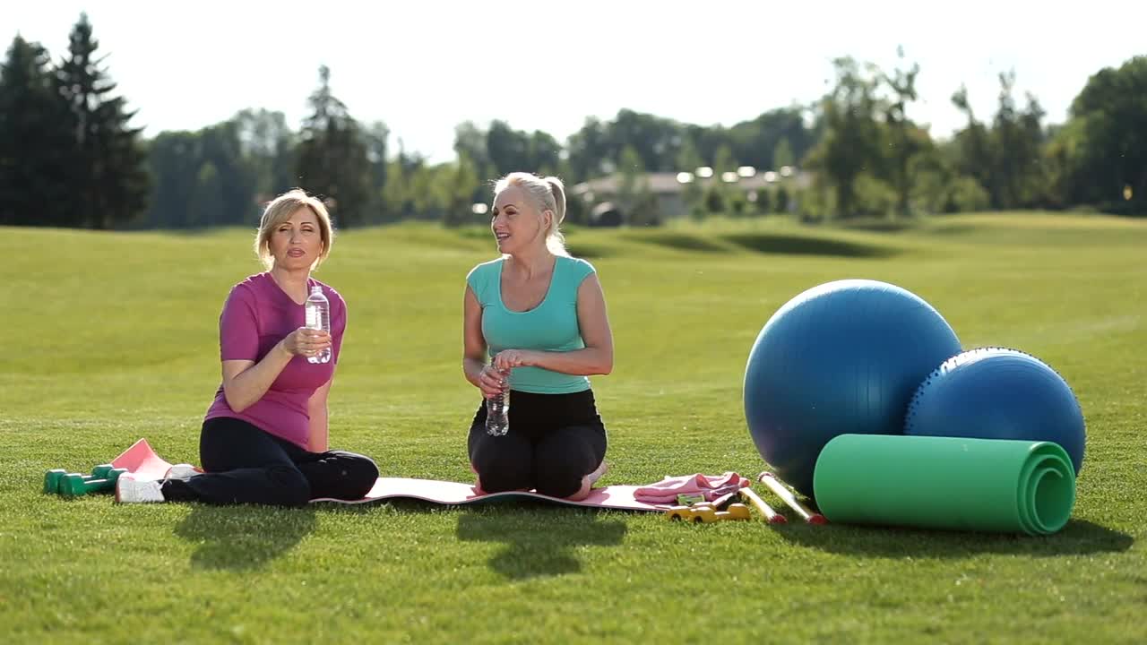 Download Stock Footage Women Taking A Break From Yoga Live Wallpaper Free