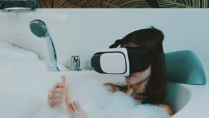 Download Stock Footage Woman Taking A Bath With A Vr Headset Live Wallpaper Free