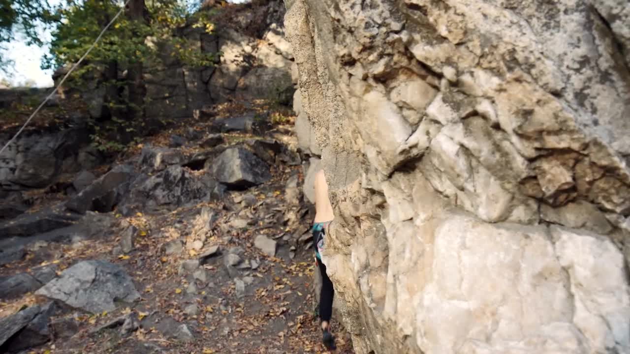 Download Stock Footage Young Man Climbing A Rock Live Wallpaper Free