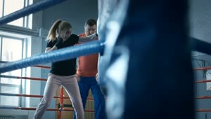 Download Stock Footage Woman Training Boxing With Trainer On The Ring Live Wallpaper Free