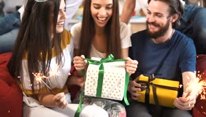Download Stock Footage Woman Opening Her Birthday Presents Live Wallpaper Free