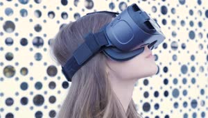 Download Stock Footage Woman Using A Vr Headset In A Bright Room Live Wallpaper Free