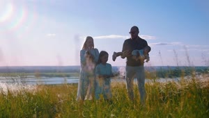 Download Stock Footage Young Family Enjoying The Sun At The Valley Live Wallpaper Free