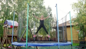 Download Stock Footage Woman Jumping On A Small Trampoline Live Wallpaper Free