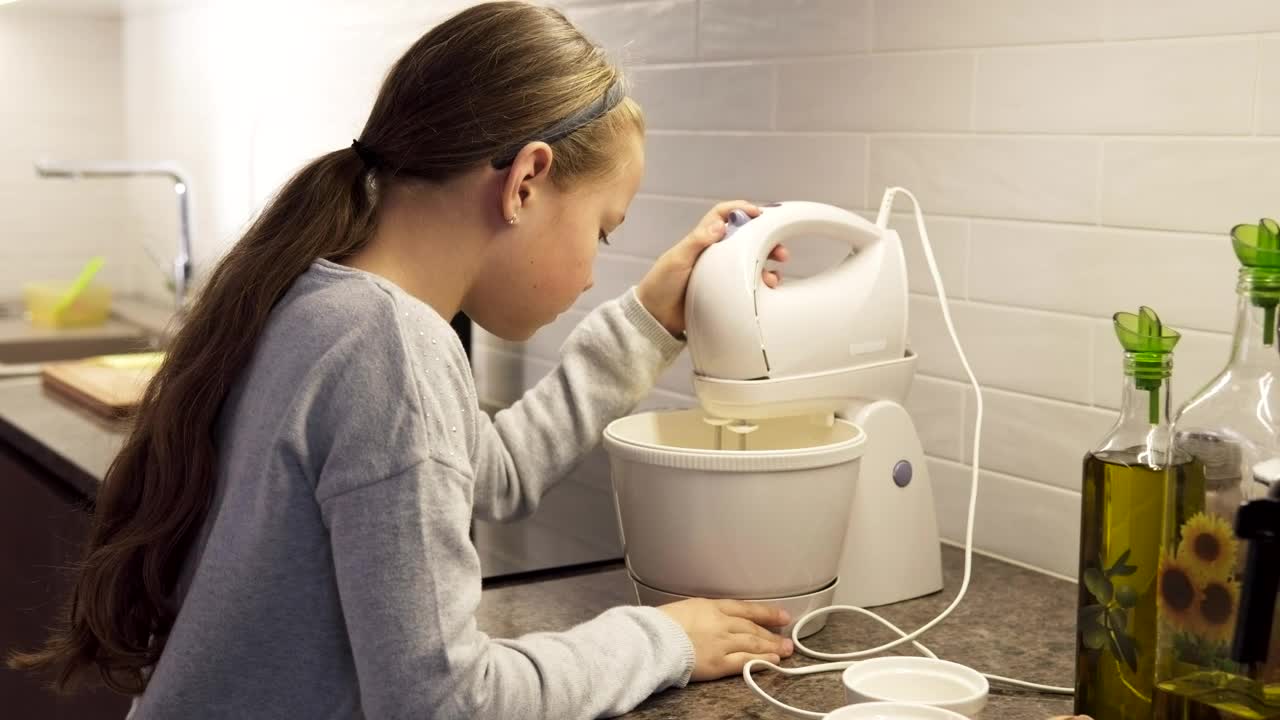 Download Stock Footage Young Girl Mixing Dough In The Kitchen Live Wallpaper Free