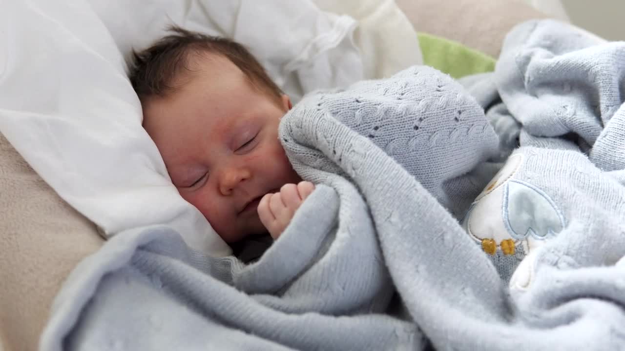 Download Stock Footage Young Baby In Blankets Live Wallpaper Free