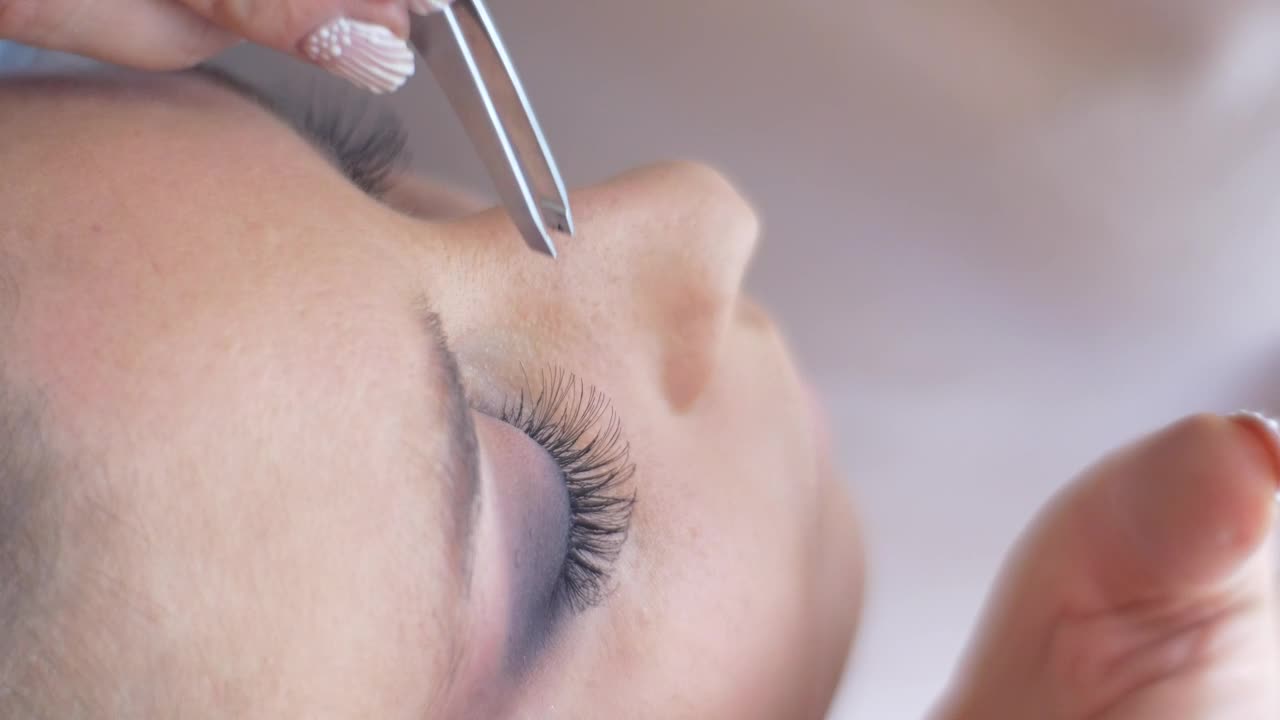 Download Stock Footage Working On A Womans Eyelashes Live Wallpaper Free