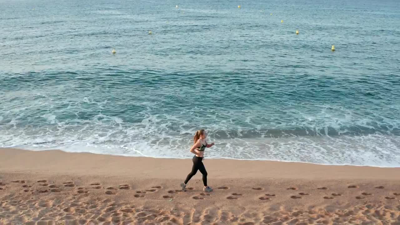 Download Stock Footage Woman Running By Shallow Waves Live Wallpaper Free