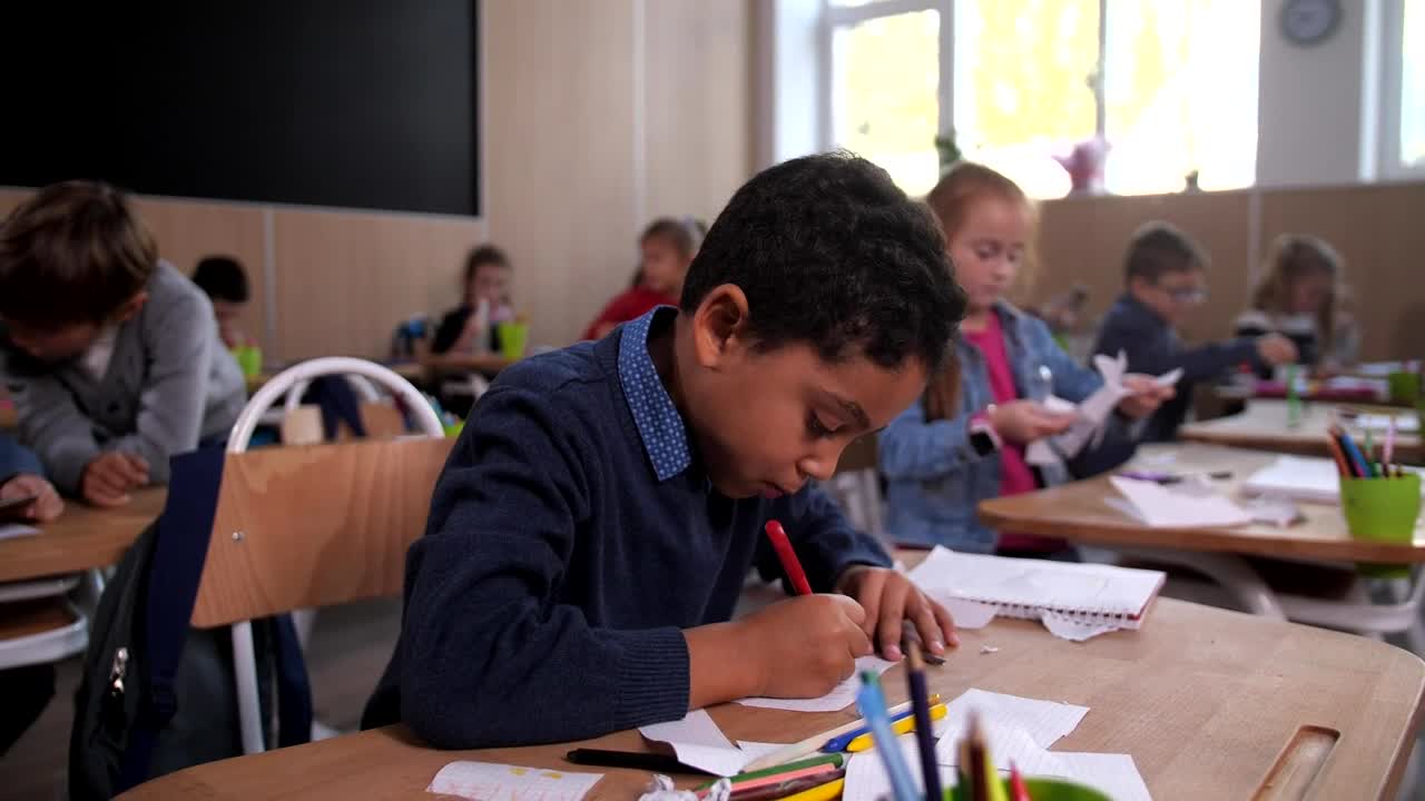 Download Stock Footage Young Man Drawing At His Desk Live Wallpaper Free