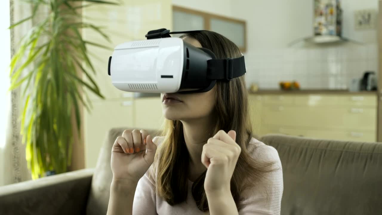 Download Stock Footage Woman Frightened Of Virtual Reality Live Wallpaper Free