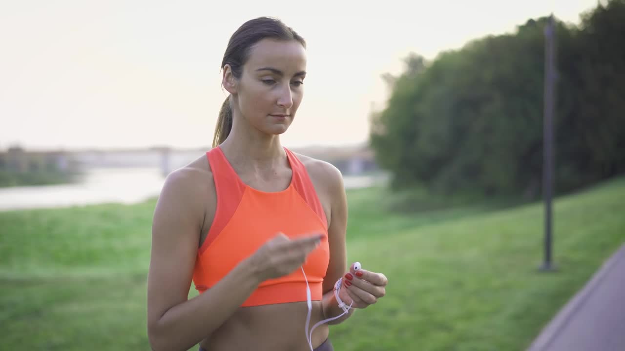 Download Stock Footage Woman Preparing To Jog Live Wallpaper Free