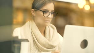 Download Stock Footage Woman Working On A Laptop At The Coffee Shop Live Wallpaper Free