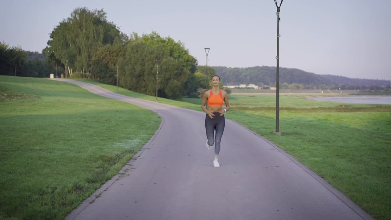 Download Stock Footage Woman Finishes Jogging Live Wallpaper Free