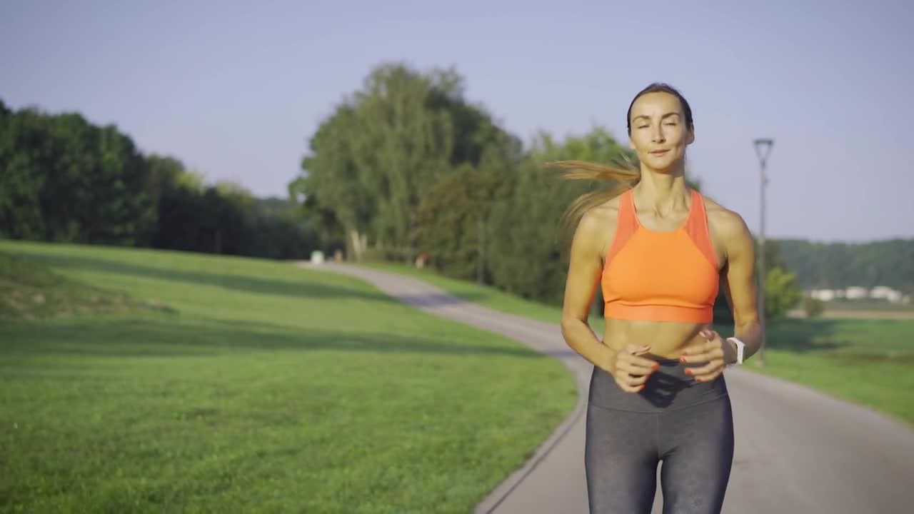 Download Stock Footage Woman Running In The Park Live Wallpaper Free