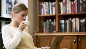 Download Stock Footage Woman Working At Home Drinking Tea Live Wallpaper Free
