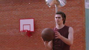Download Stock Footage Young Man Spinning A Basketball Ball On The Finger Live Wallpaper Free