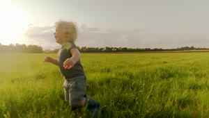 Download Stock Footage Young Boy Walking Outside Live Wallpaper Free