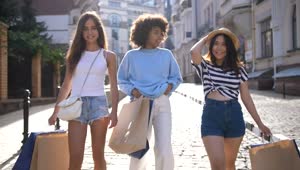 Download Stock Footage Women Carrying Their Shopping In Town Live Wallpaper Free