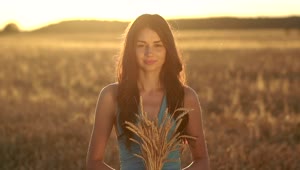 Download Stock Footage Young Woman Holding Wheat Live Wallpaper Free