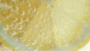 Download Stock Footage Yellow Lemon Slice In Soda Live Wallpaper Free