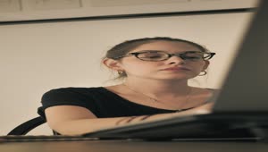 Download Stock Footage Woman Finishes Work And Closes Her Laptop Live Wallpaper Free