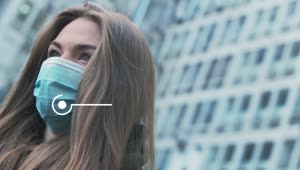 Download Stock Footage Woman With A Mask And An Animated Text Of Covid Live Wallpaper Free