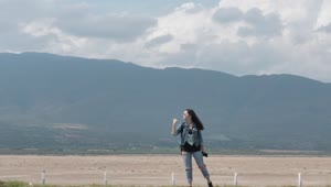 Download Stock Footage Woman Hitchhiking By The Road Live Wallpaper Free